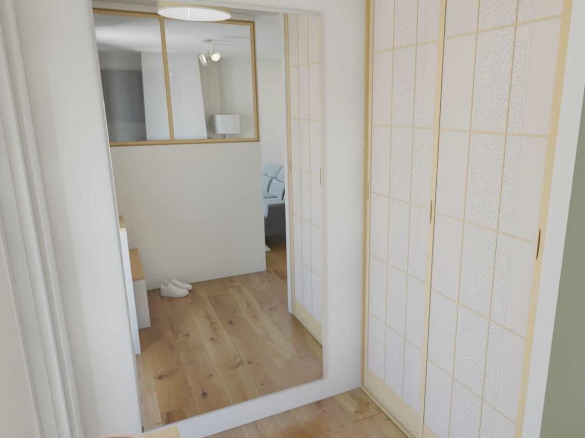 Grand miroir et verrière Vue d'une entrée lumineuse avec un miroir toute hauteur et des placards fermés par des panneaux japonais - consultante en aménagement intérieur en gironde